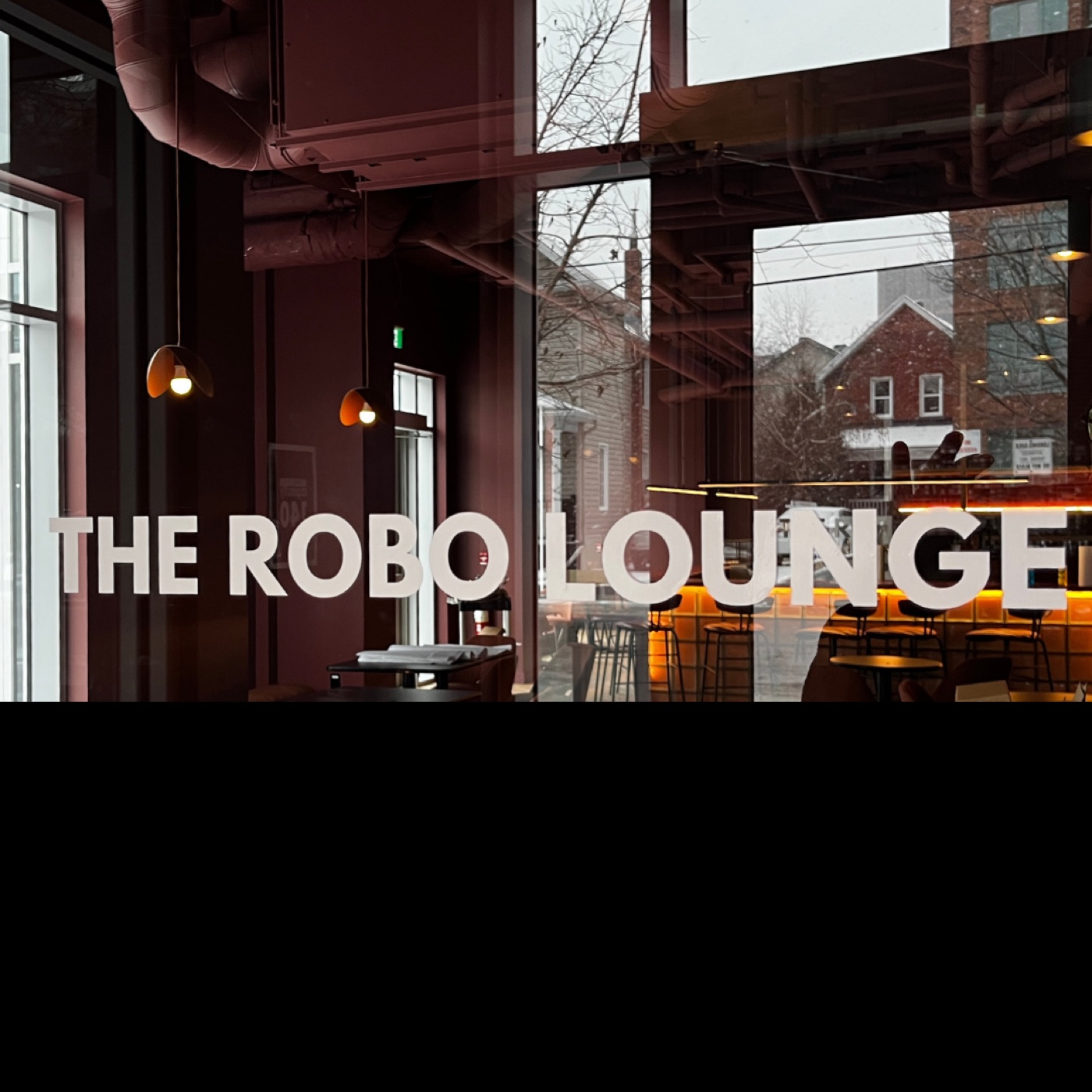 The Robo Lounge name across the venue window.